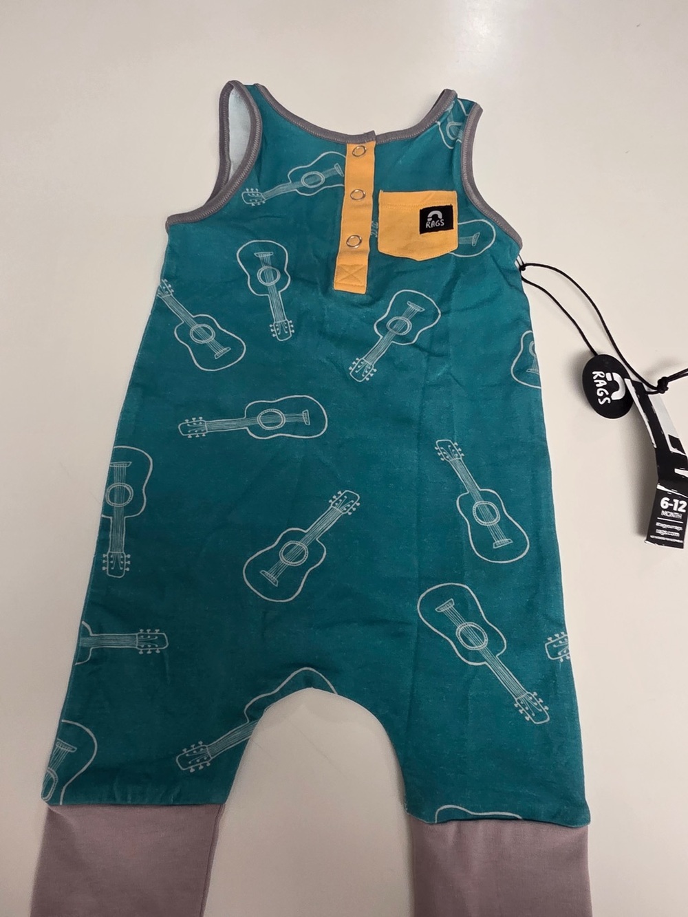 Rags to Ratches guitar romper